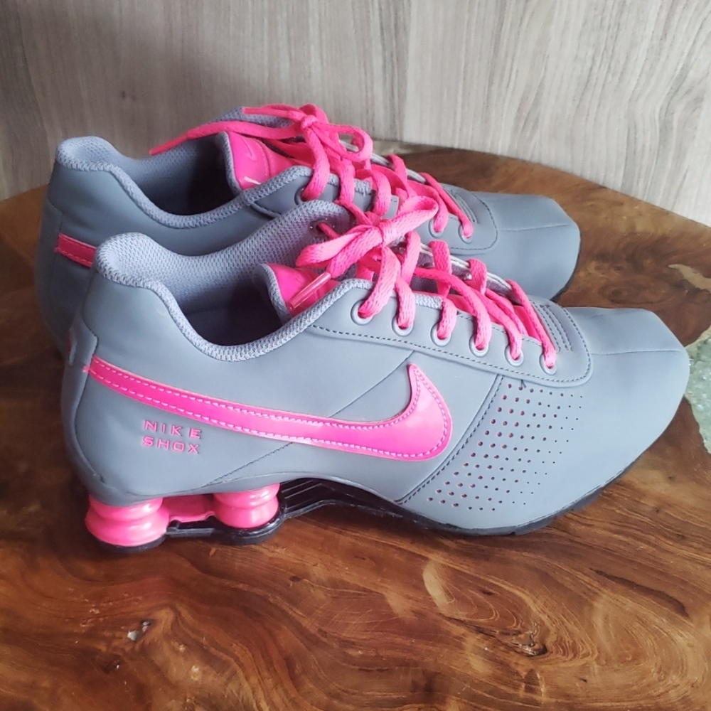 Pink and gray Nike Shox